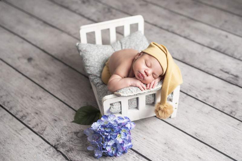 camas para bebés :: Fotógrafo recién nacidos